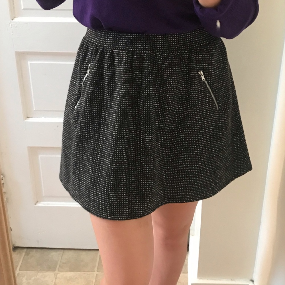 Black knit skirt with accent zippers